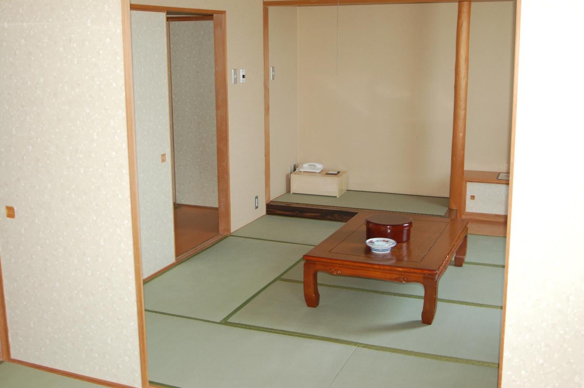 Shizunai Eclipse Hotel Shinhidaka Rum bild
