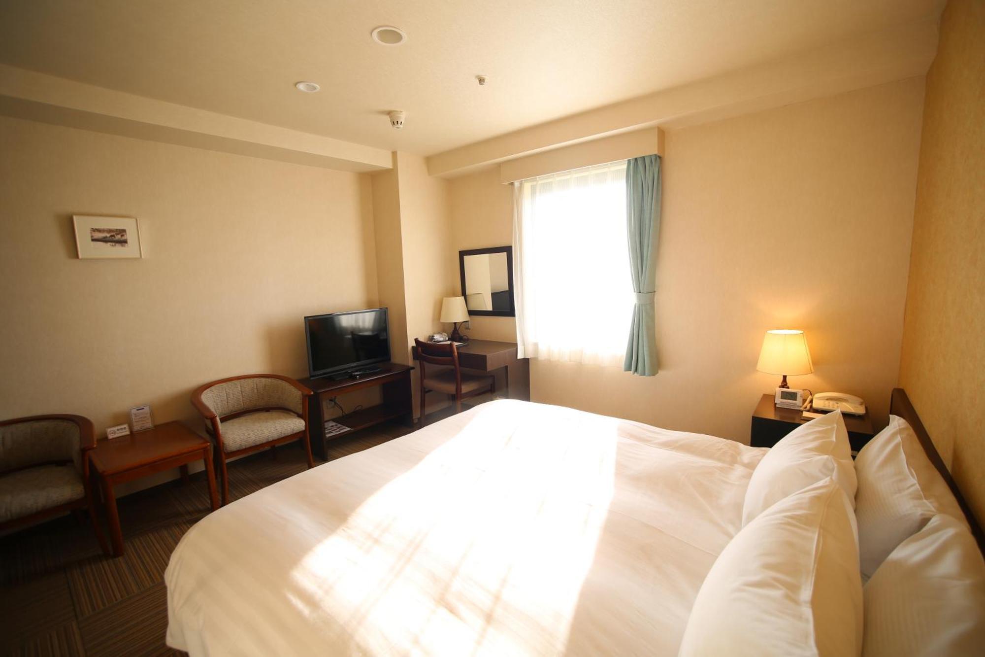 Shizunai Eclipse Hotel Shinhidaka Rum bild