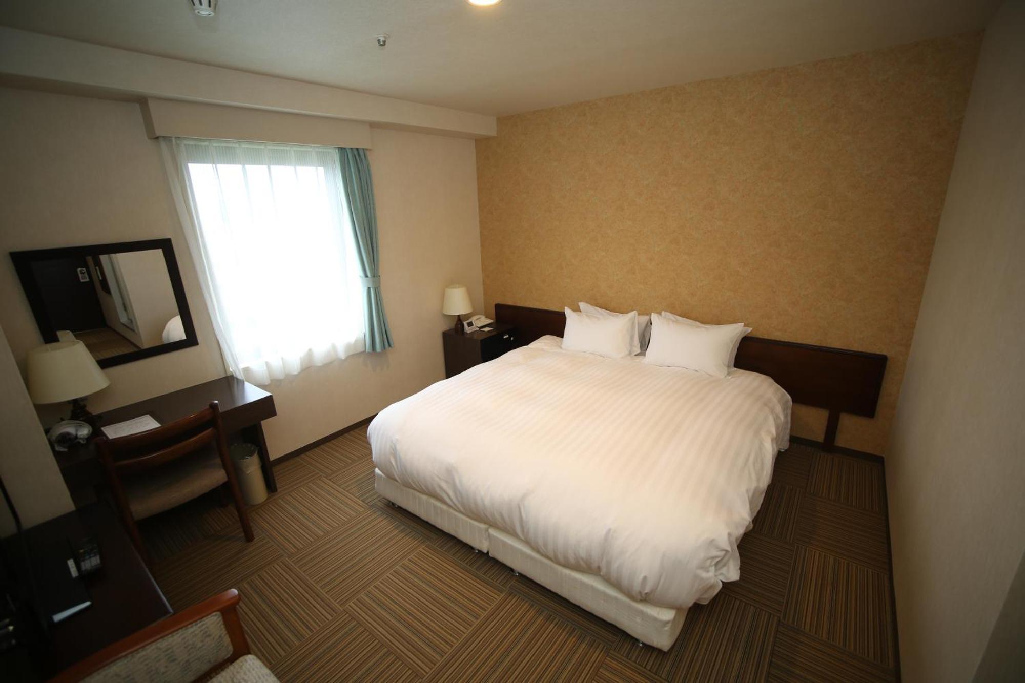 Shizunai Eclipse Hotel Shinhidaka Rum bild