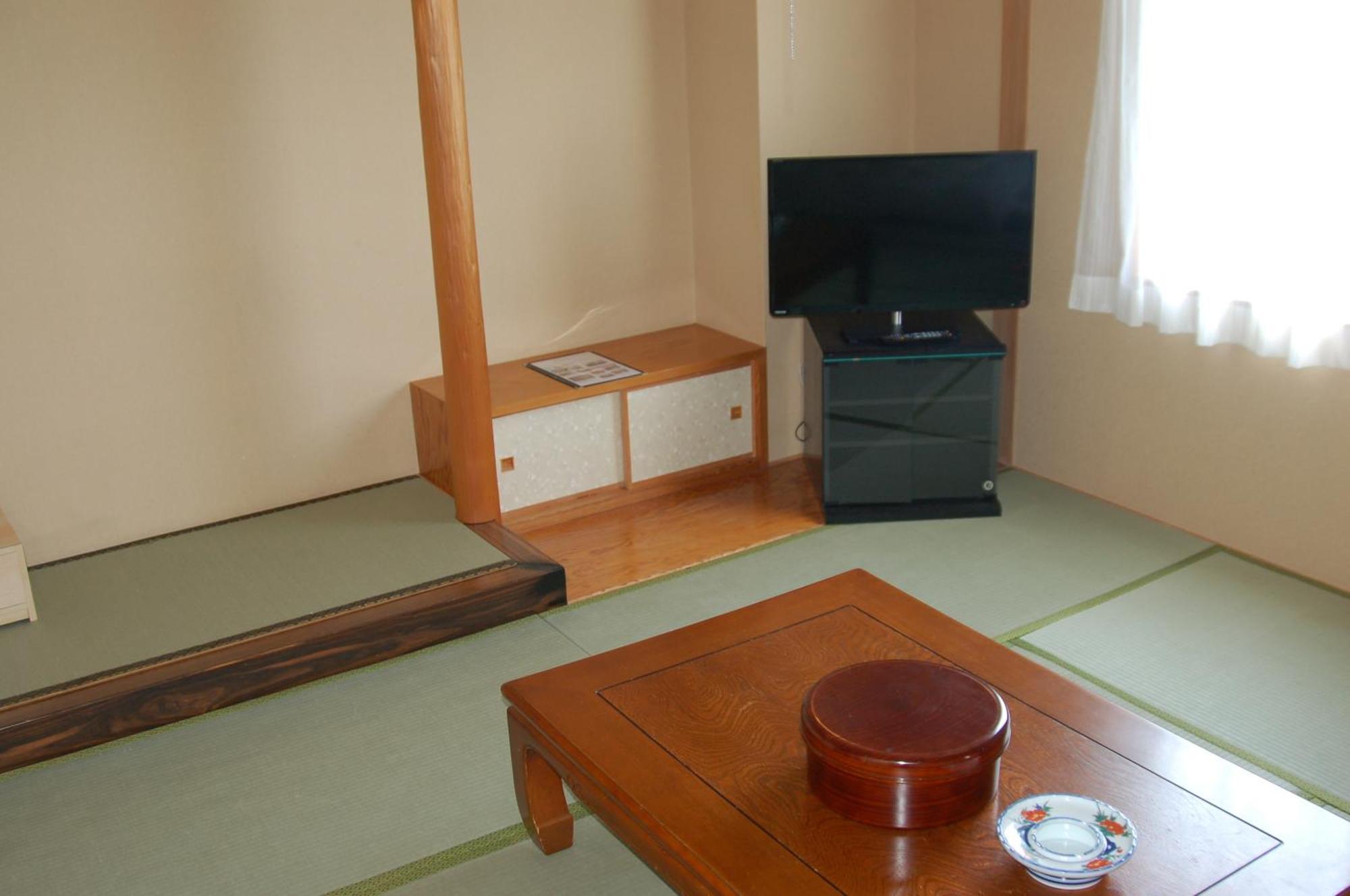 Shizunai Eclipse Hotel Shinhidaka Rum bild
