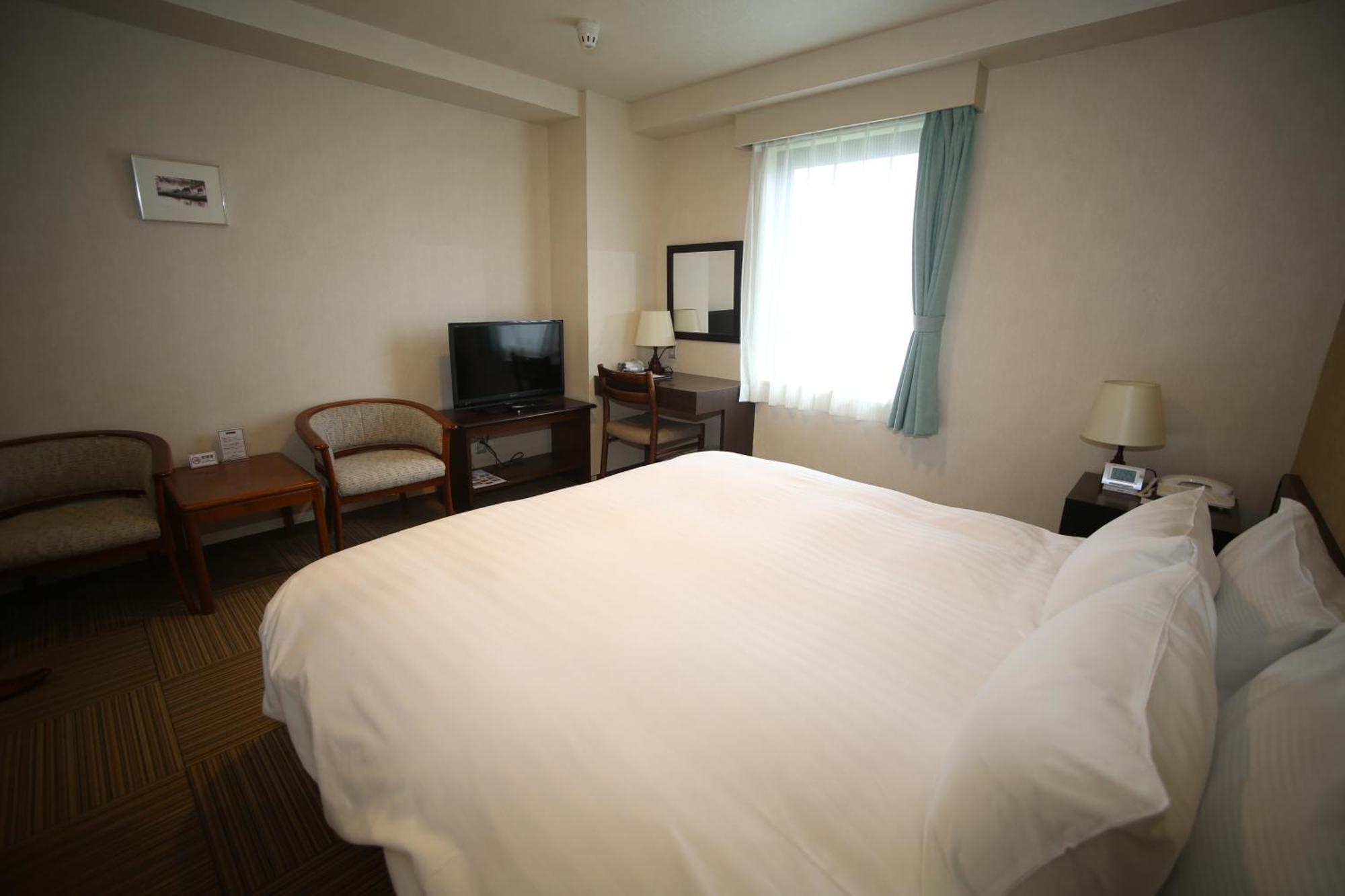 Shizunai Eclipse Hotel Shinhidaka Rum bild