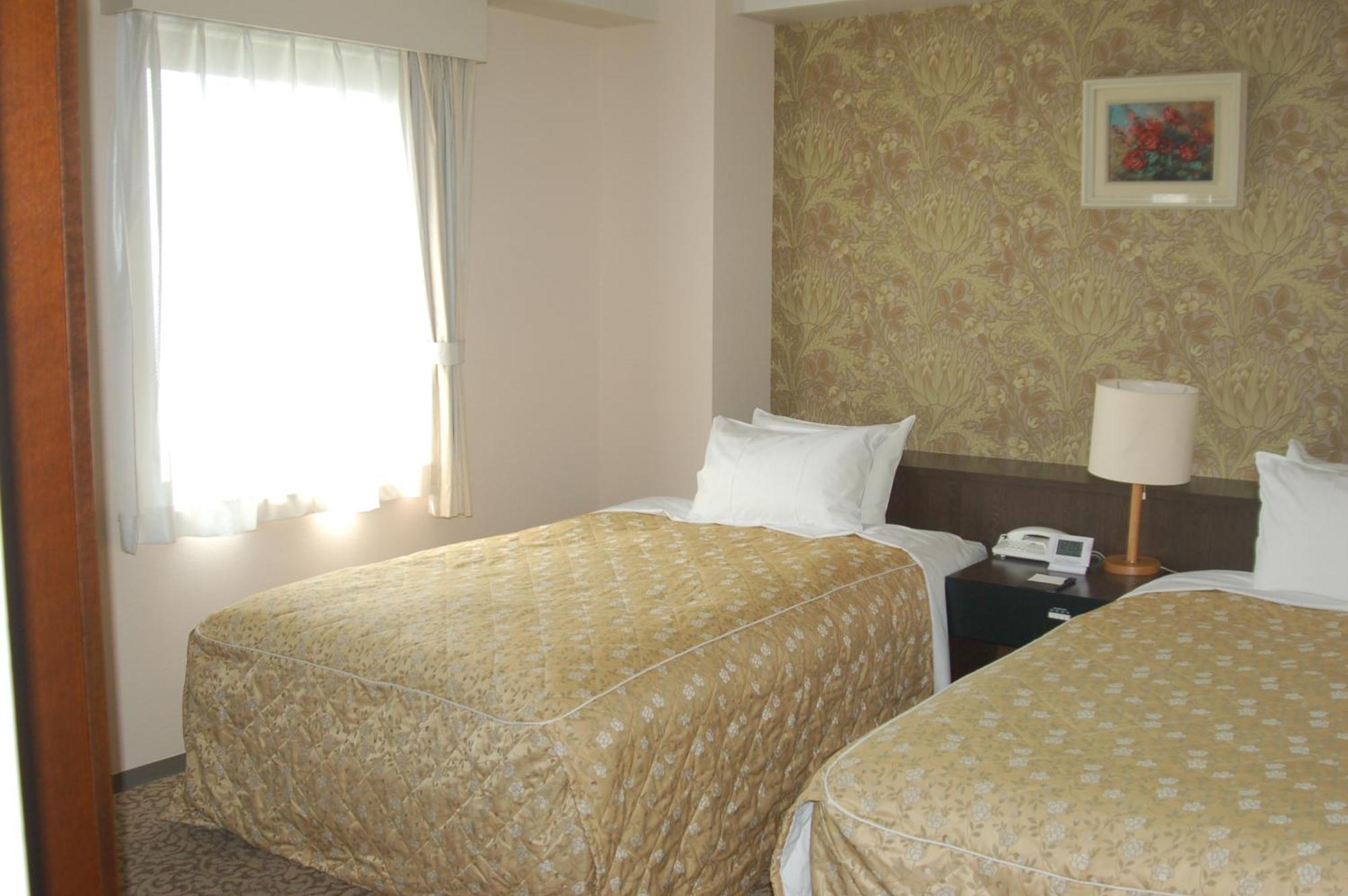 Shizunai Eclipse Hotel Shinhidaka Rum bild