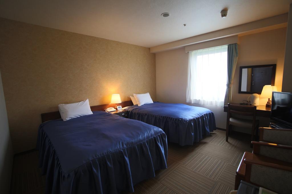 Shizunai Eclipse Hotel Shinhidaka Rum bild